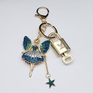 Authentic Louis Vuitton Lock & Key with Unbranded Fairy Charm, Keychain